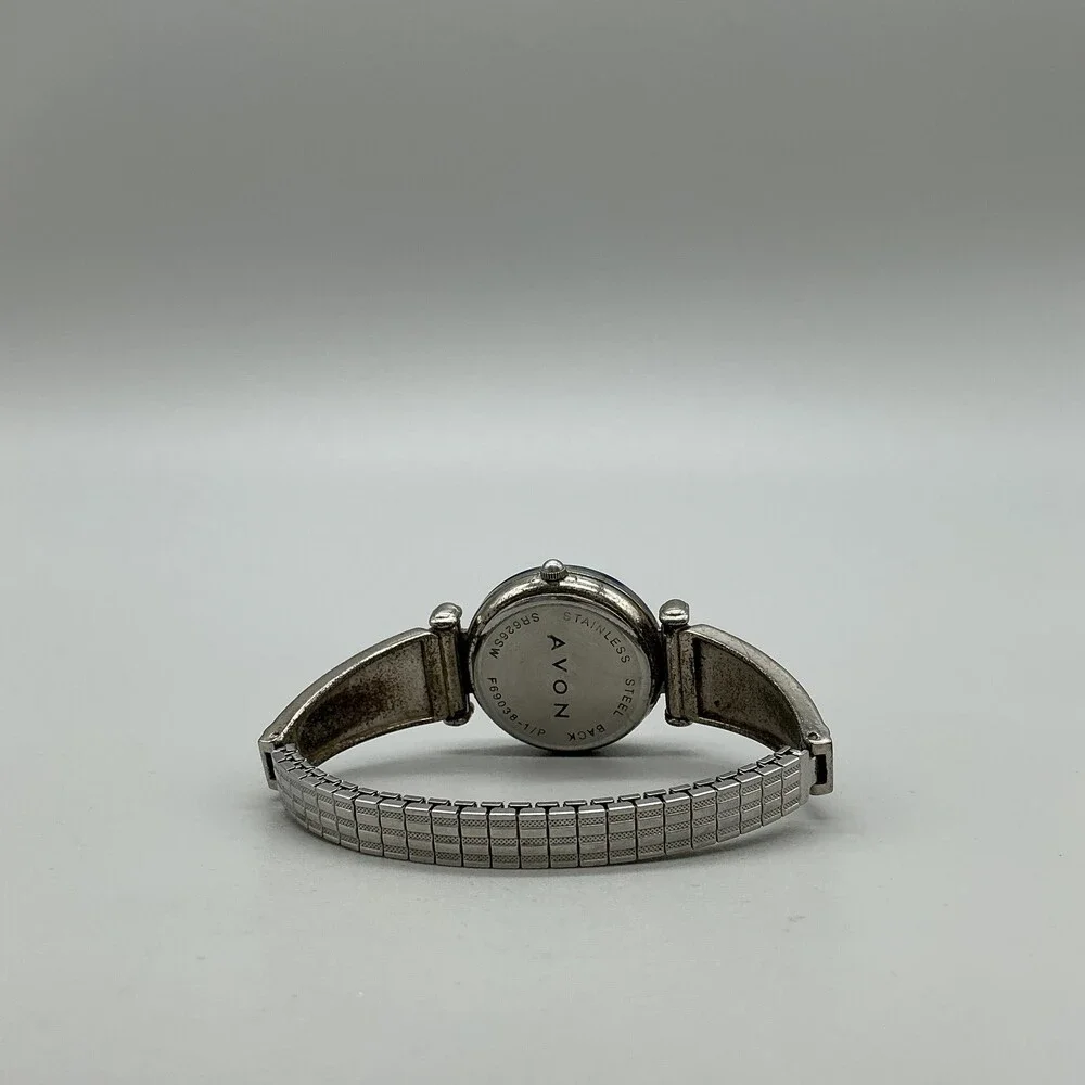 Avon F69038-1/P Women Watch 27mm Silver Tone Blue Bezel Stretch Band New Battery